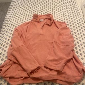 Out from under pink cozy/fuzzy sweater